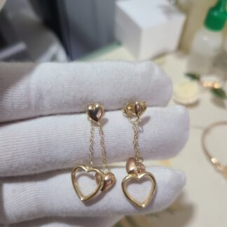 14k yellow gold 2 in one heart earrings 1.80 grams.