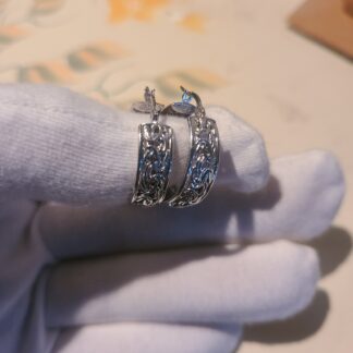 14k white gold byzantine hoops.