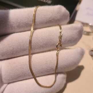 14k gold thin bracelet 7.1" long.